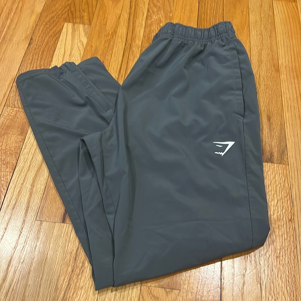 Gymshark gray pants, tapered/zip bottoms, M